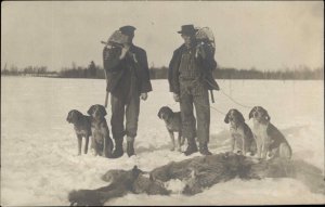 Hunting GREAT IMAGE! Men Guns Snowshoes Dogs Coyotes or Wolves RPPC c1910