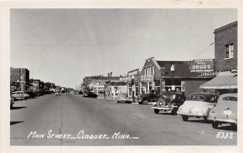 D96/ Cloquet Minnesota Mn Real Photo RPPC Postcard c1930s Main Street Store Auto