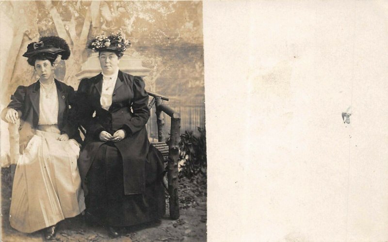 1910s RPPC Real Photo Postcard Fancy Fashion Women Hats Seated On Log Bench