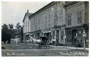 Sandy Creek NY Store Fronts Barber Pole Horse & Wagans Super RPPC Postcard