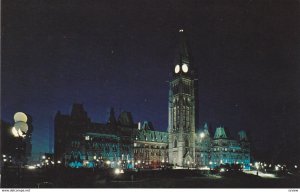 OTTAWA, Ontario, Canada, PU-1960s; The Canadian Houses of Parliament Illumina...