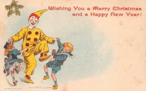 MERRY CHRISTMAS & HAPPY NEW YEAR HOLIDAY CHILDREN CLOWN OUTCAULT POSTCARD (1905)