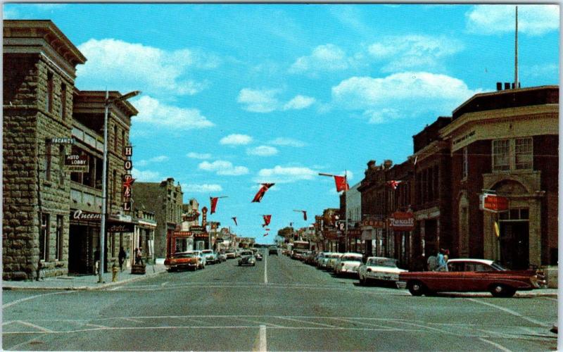 FORT MACLEOD, ALTA  CANADA  MAIN  STREET SCENE   c1950s   Cars    Postcard 