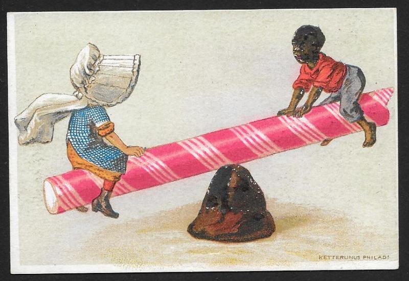 VICTORIAN TRADE CARD White Girl & Black Boy on Candy Cane Seesaw