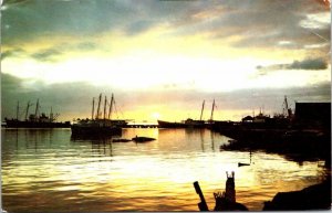 VINTAGE POSTCARD SUNSET AT PORT OF SPAIN TRINIDAD PLUS STAMPS ON REAR 1970s