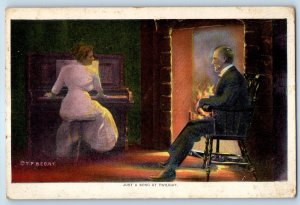 c1910's Woman Playing Piano Just A Song At Twilight Fireplace Antique Postcard