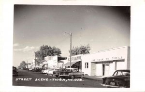 Tioga North Dakota Bank Street Scene Real Photo Postcard AA27191