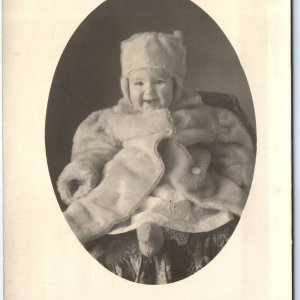 c1910s Adorable Baby Boy Smile RPPC Winter Coat Hat Cute Laugh Real Photo A140