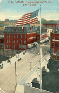 Postcard 1914 View of Old Glory waving over Aurora, IL., City of Lights.  L1