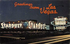 THE STARDUST Las Vegas, NV Night View Roadside Neon Casino 1965 Vintage Postcard