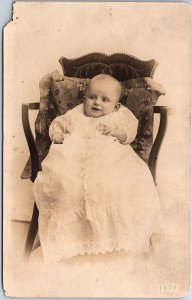 VINTAGE POSTCARD HAPPY SMILING BABY IN CHAIR REAL PHOTO 1904-1918 corner chip