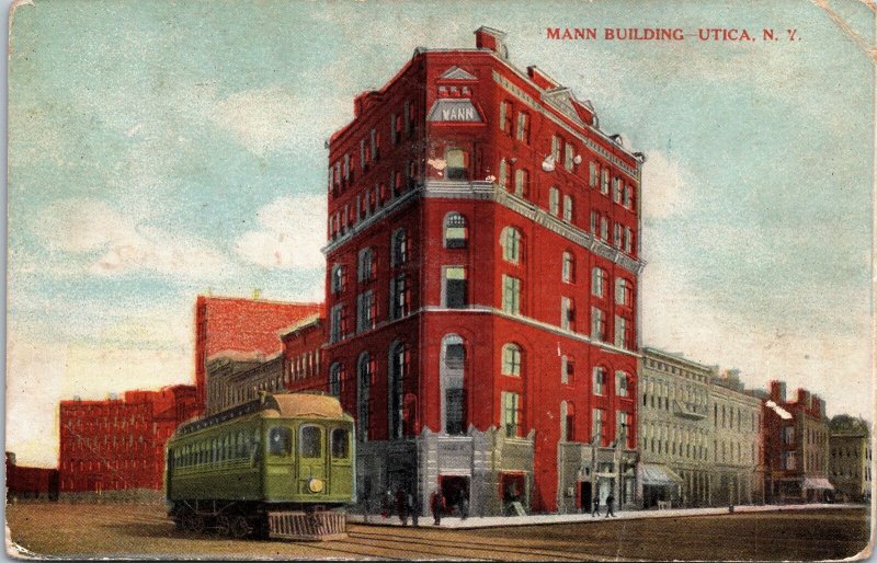 VINTAGE POSTCARD MANN BUILDING TROLLEY STREET SCENE AT UTICA N.Y. POSTED 1910