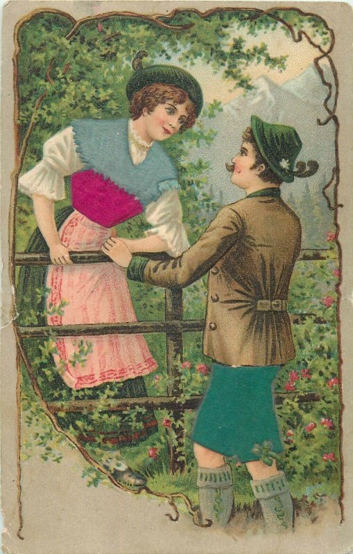 Novelty 1904 embossed silk velvet material alpine folk couple chromo postcard