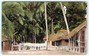 1910's DRYING HEMP AT MASSIS LEYTE P.I. PHILIPPINES THATCHED HUTS POSTCARD