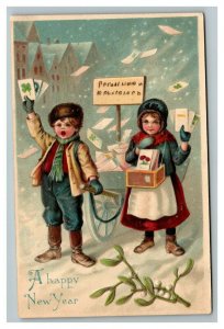 Vintage 1910's New Year Postcard Cute Kids Selling Cards Snow Small Town