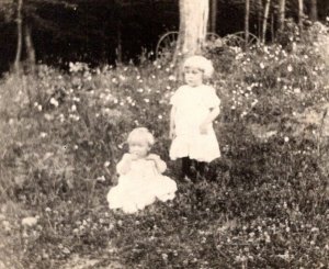 RPPC  Young Children in Wildflowers  - Real Photo Postcard  c1910