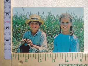 Postcard Young Amish children, Greetings From The Amish Country, Pennsylvania