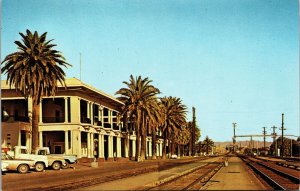 Needles Railroad Depot California Postcard Railroad Tracks old Trucks UNP Chrome