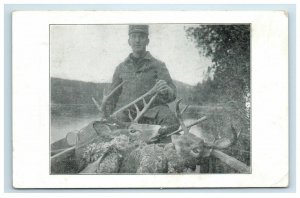 c. 1911 Hunter Bucks Deer Heads Canoe Boat Hunting Postcard