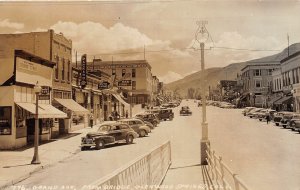 J27/ Colorado Springs RPPC Postcard c1940s Grand Ave Stores Autos 299