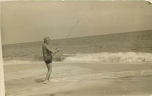 c1945 RPPC; Man Surf Fishing from Beach w/ Rod & Reel, posted Blue Point L.I. NY