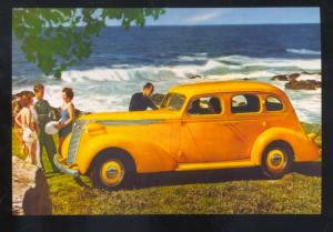 1937 STUDEBAKER SEDAN CAR DEALER ADVERTISING POSTCARD '37 YELLOW CARS