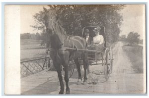 c1910's Well Dressed Man Woman Horse Wagon Bridge RPPC Carriage Photo Postcard 