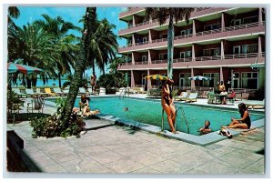 c1960 The Dolphin Nassau's Beach Hotel Restaurant Swimming Pool Bahama Postcard