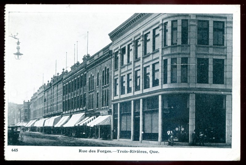 dc974 - TROIS RIVIERES Quebec Postcard 1920s Rue des Forges. Stores