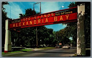 Postcard 1000 Islands NY c1966 Alexandria Bay Sign Old Cars
