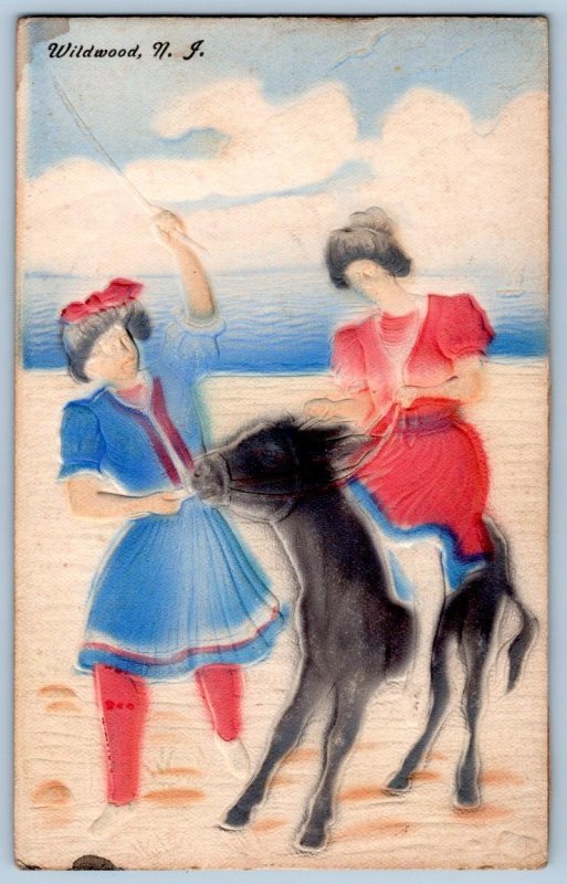 1911 WILDWOOD NJ AIRBRUSHED EMBOSSED WOMEN ON BEACH DONKEY JACKASS BURRO WHIP