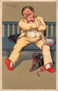 Comic Humor 1909 Drunk Man Asleep on Bench Pour Drink Dog embossed postcard C357