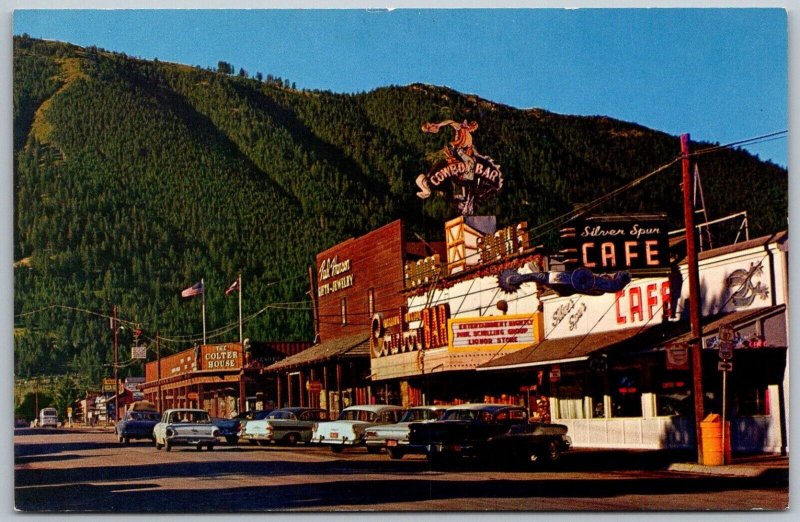 Jackson Wyoming 1960s Postcard Street Scene Cars Cowboy Bar Silver Spur Cafe