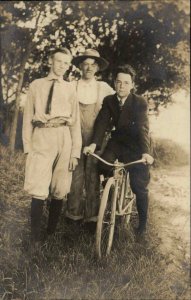 3 Young Men & a Bicycle c1910 Real Photo Postcard