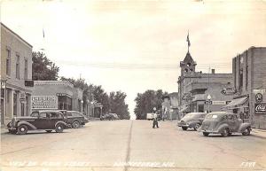 Winneconne WI Street View Business District Rexall Drugs Old Cars RPPC Postcard