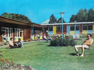 Holidaymakers Relax by Chalets Pontins Holiday Village Hemsby Vtg Postcard 1981