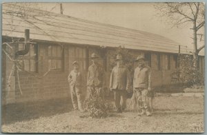 SOLDIERS GROUP IN THE CAMP ANTIQUE REAL PHOTO POSTCARD RPPC