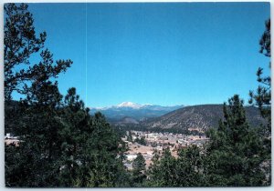 Skiing on Sierra Blanka (Old Baldy) seen in the distance - Ruidoso, New Mexico