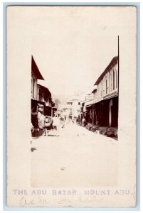 c1920's The Abu Bazaar Street View Cow Mount Abu India  RPPC Photo Postcard 