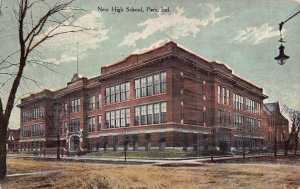 PERU INDIANA~NEW HIGH SCHOOL-BEAUTIFUL BRICK WORK-DIRT ROAD~1911 POSTCARD