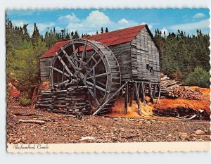 Postcard A side view of an old fashion water wheel, Deep Bight, Canada