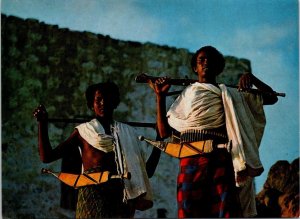 VINTAGE CONTINENTAL SIZE POSTCARD MEN OF THE DANAKIL ETHIOPIA STAMPS MAILED 1980