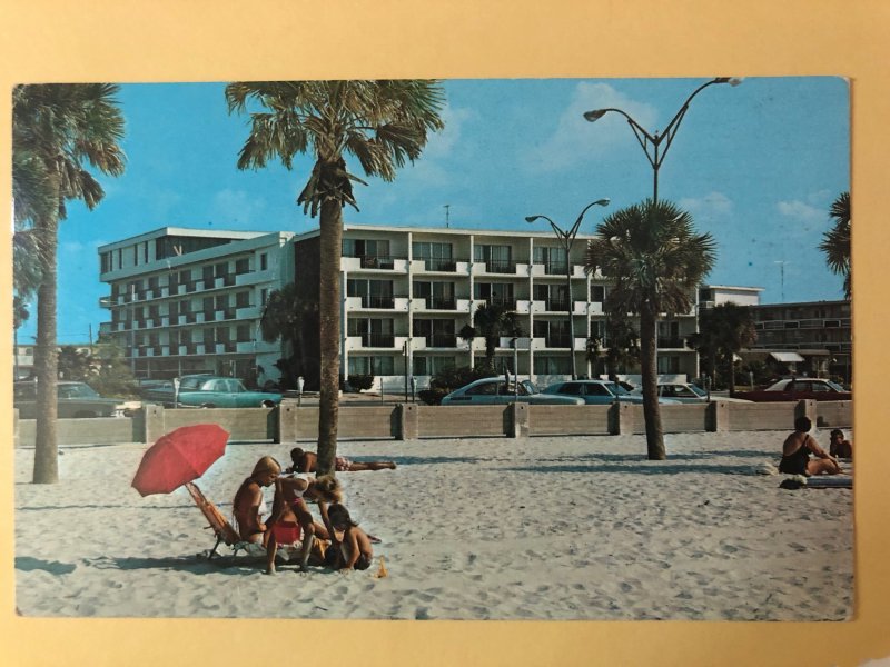 Beach view of 400 Motel with vintage cars on Clearwater Beach, Florida (FL-21)