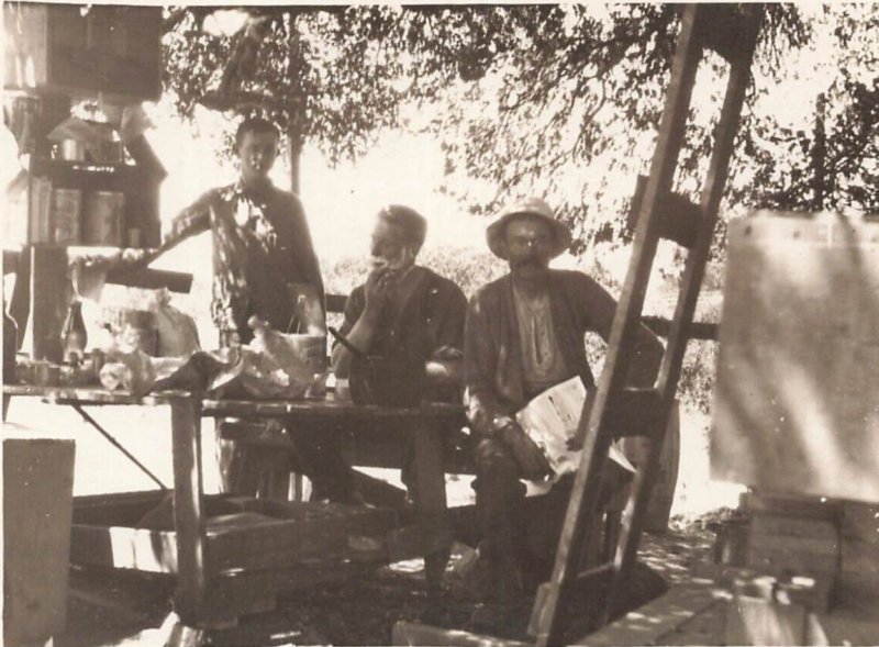 MAN SHAVING & MEN SITTING AT OUTSIDE TABLE-1910s REAL PHOTO POSTCARD