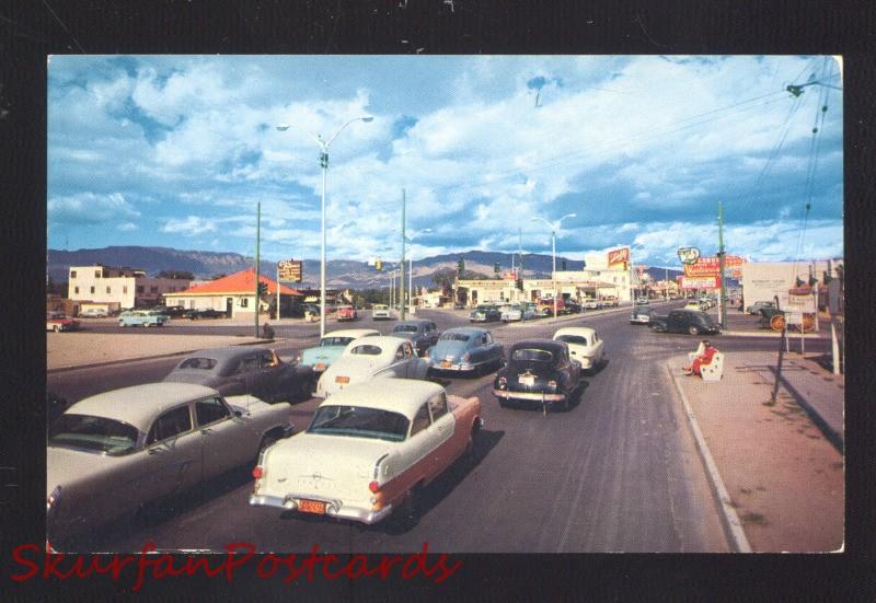 ALBUQUERQUE NEW MEXICO ROUTE 66 1955 OLDSMOBILE CARS STREET SCENE OLD POSTCARD