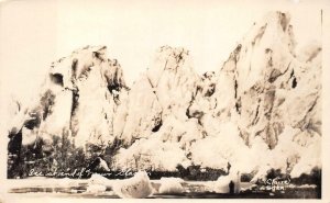 RPPC SCENE AT END OF (?) GLACIER ALASKA REAL PHOTO POSTCARD (c. 1920)