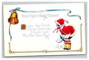 Vintage 1920's New Years Postcard Girl with White Puppy Gold Bell Blue Bow NICE