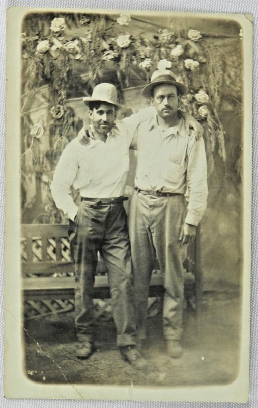 Two Middle Aged Men in Work Clothes Get Picture Together- Vintage Postcard