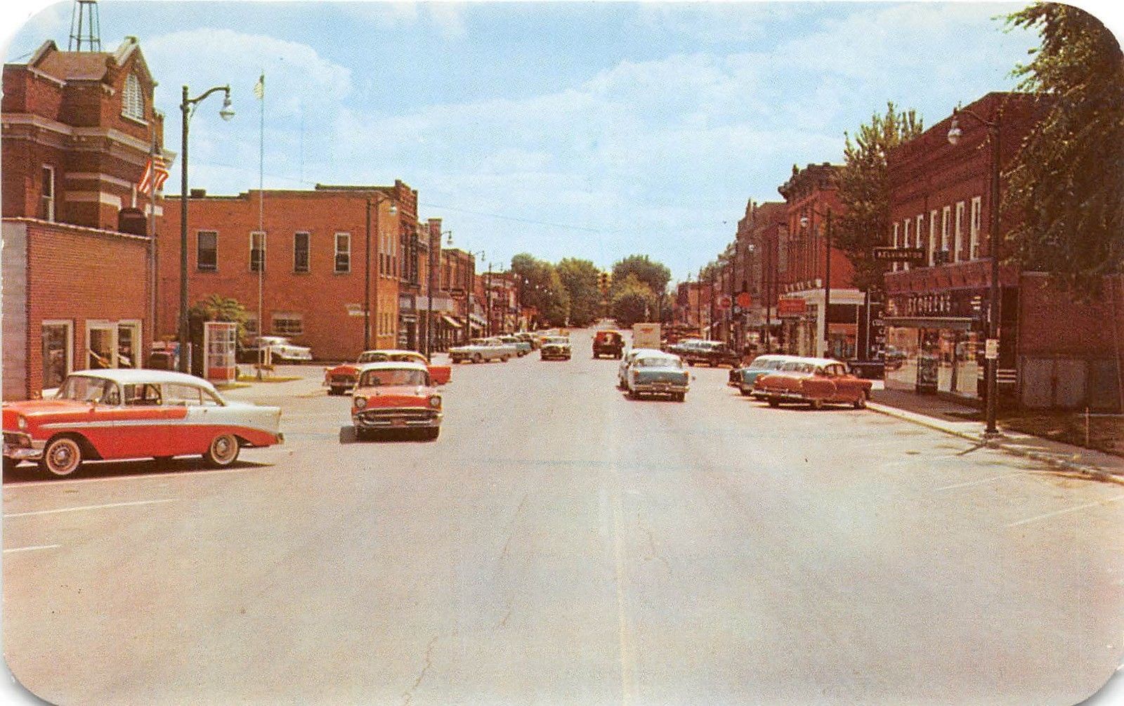 B42/ Archbold Ohio Postcard Chrome Defiance Street Stores Automobiles