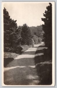 RPPC Edwardian Woman On Long Dirt Path Within The Pine Trees Postcard Q27